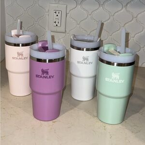 Lot of four 20 oz stanley water bottles in pastel colors